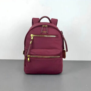 tumi backpack plum - Voyageur Raina - Women's Premium Leather Backpack - Everyday Bag with Phone Pocket & Laptop Compartment Be prepared for extra carrying needs with the TUMI Voyageur Just In Case Backpack TUMI Voyageur Celina Backpack